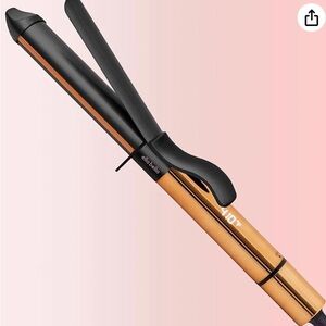 Black and Gold Curling Iron.    D